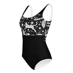 Side view of leotard with a funny cat pattern on a black and white leotard for Halloween