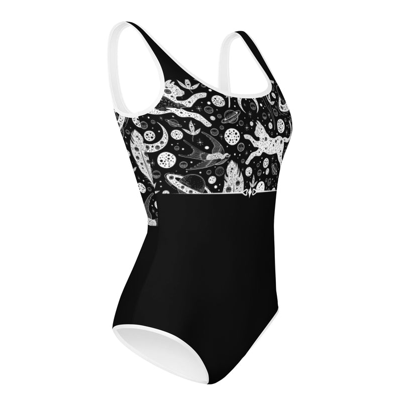 Side view of leotard with a cute spooky cat pattern on a black and white leotard for Halloween